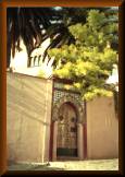Mosque and keyhole-shaped gate in The Albaicín (Arab quarter), in Granada, Andalusia, Spain.